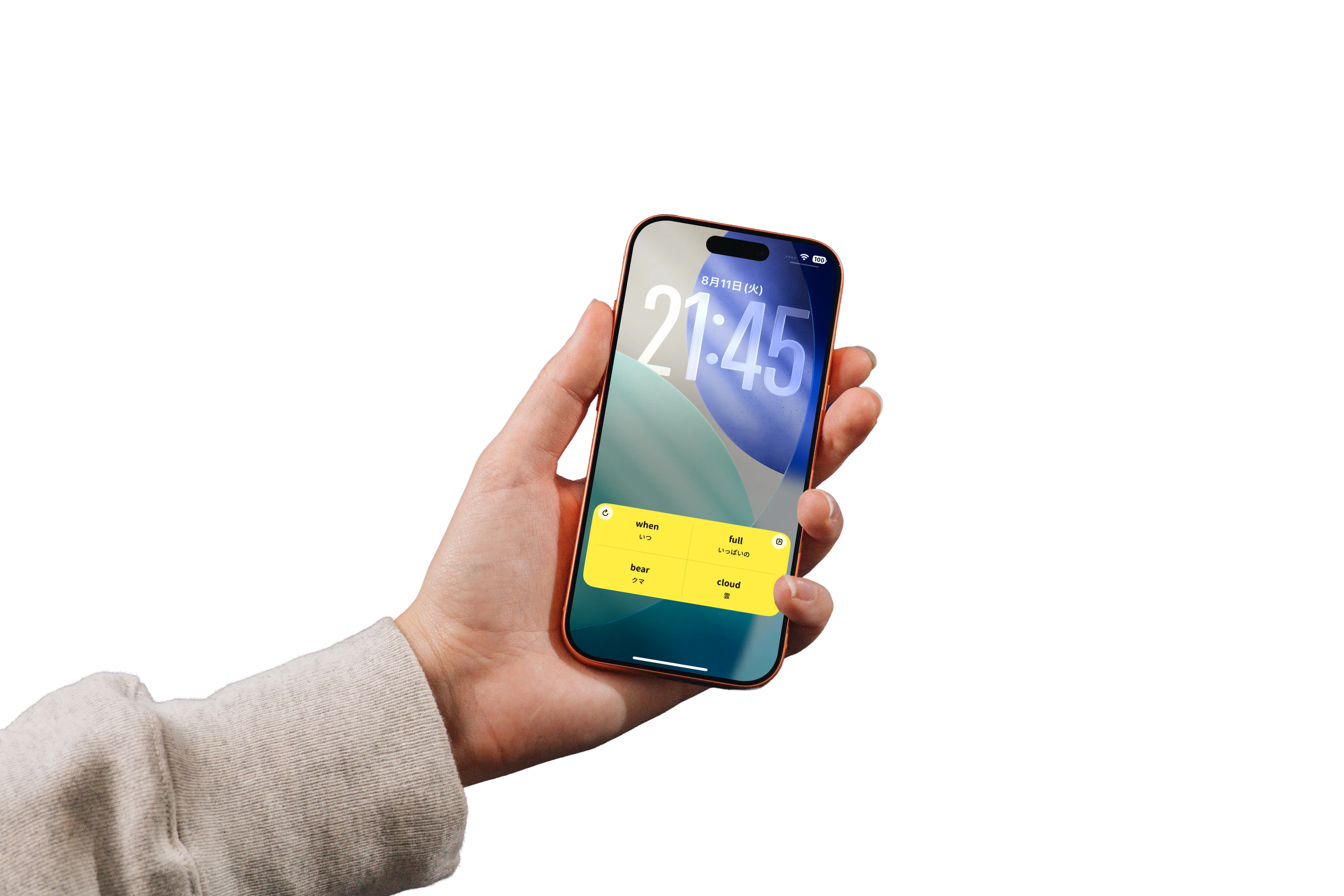 英単語カードをロック画面に表示したiPhoneを手に持っている様子